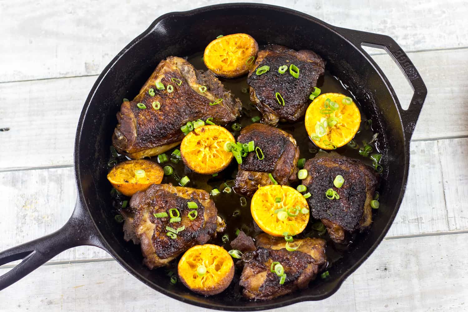 Tangerine Chicken Thighs Cooked in a Cast Iron Skillet