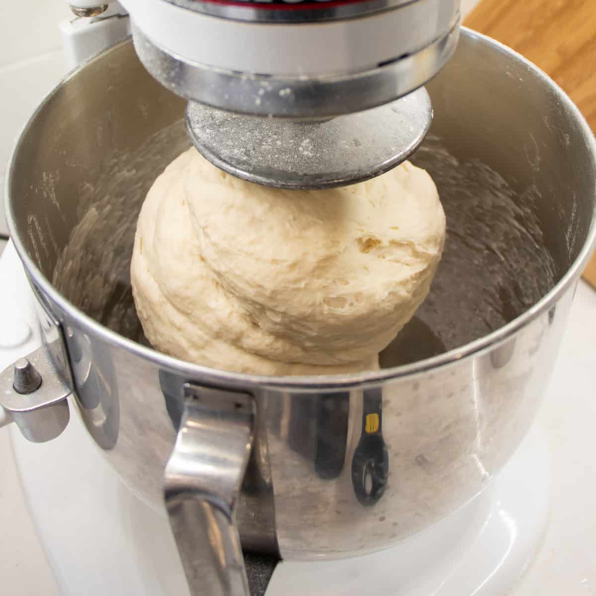 Kneaded dough in the stand mixer bowl.